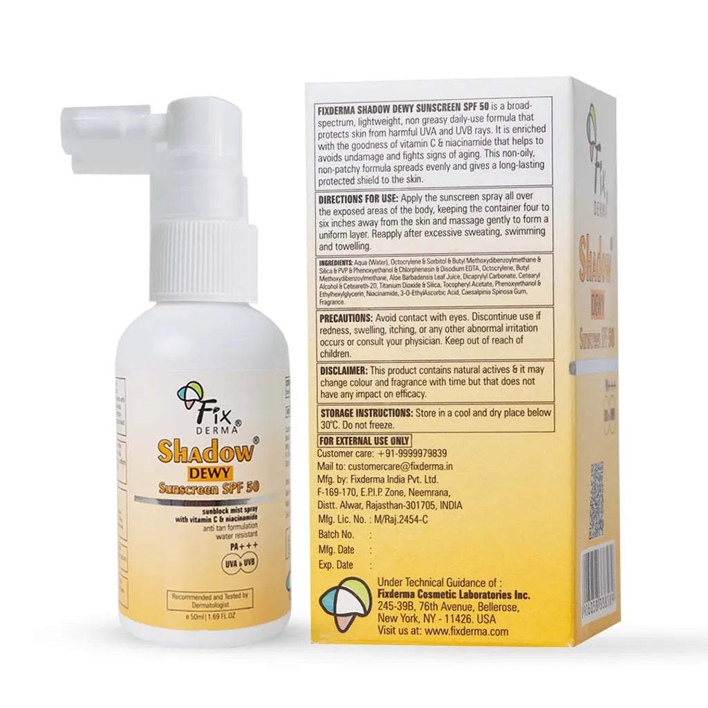 Spray bottle of Fixderma Shadow Dewy SPF 50 Sunscreen next to its box