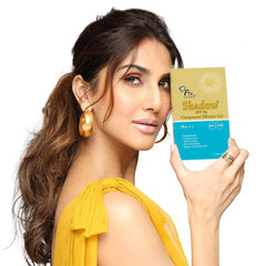 Model holding bottle of Fixderma Shadow Sunscreen SPF 30 Transparent Silicone Gel